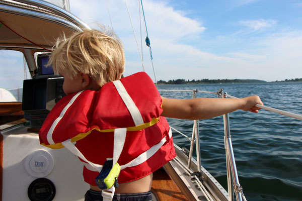 Cove Henry Holloway aboard Tiny Bubbles II. “The boys think it’s neat to take your house with you when you move around.” As part of the Casco Bay Stories Project, Heidi and Josh Holloway share their story about living on a sailboat with two young children in Casco Bay.